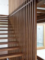 wood stair with wood wall panel