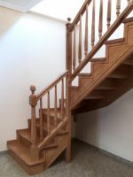 wood stair with decorative handrail