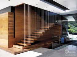 suspended wooden steps with cable railing