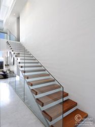 suspended stair with glass railing